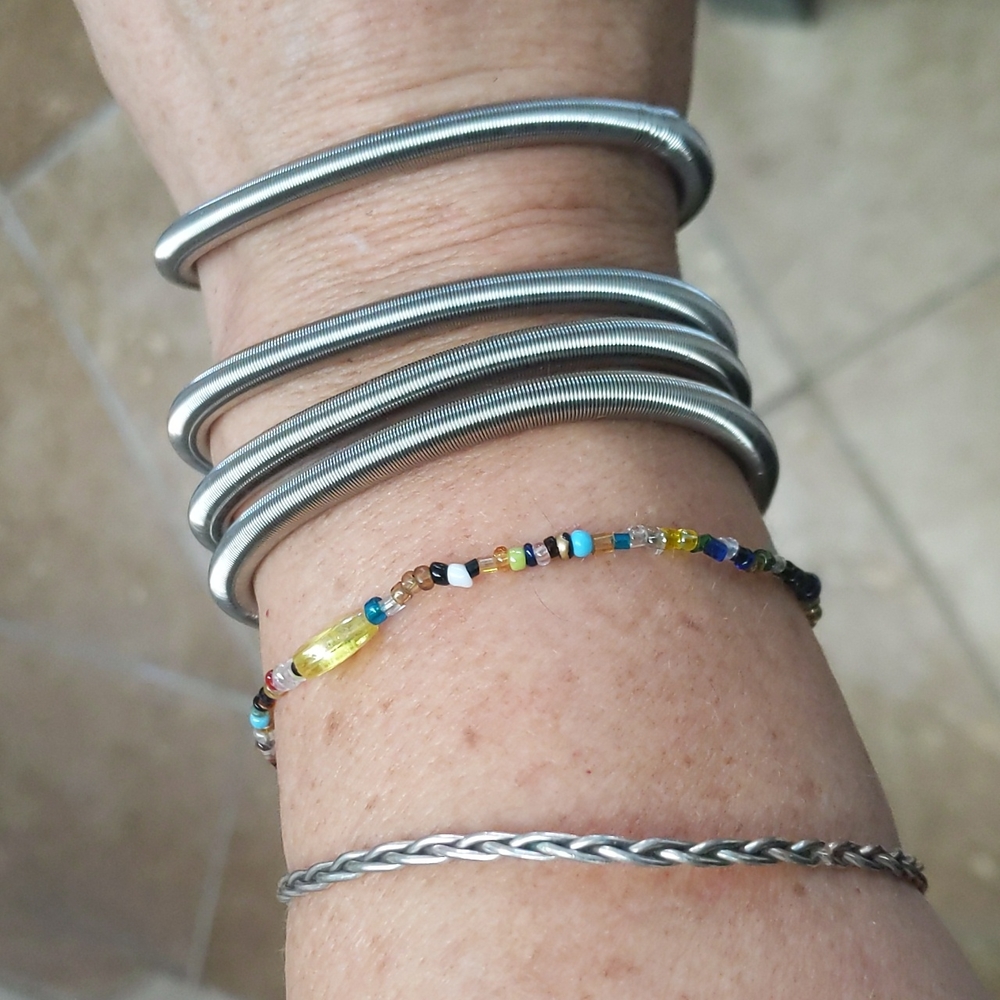 5$ Each Or 3 for 10$Stainless Steel Stretchy Slinky like Guitar String Bracelets